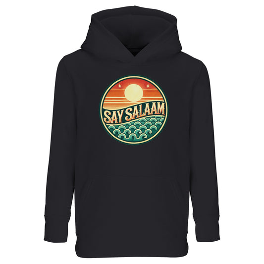 Say Salaam Sunset Glow Part-Recycled Cotton-Poly Kids Hoodie in Black, a deep jet black shade similar to Zeus charcoal black. The vibrant circular sunset emblem glows against the dark base, highlighting warm sun tones and cool teal wave detailing. Crafted from a cotton and recycled polyester blend with soft brushed fleece interior for warmth and durability. A relaxed fit hoodie designed for football fans, school days and modest children’s streetwear with confident Muslim identity.