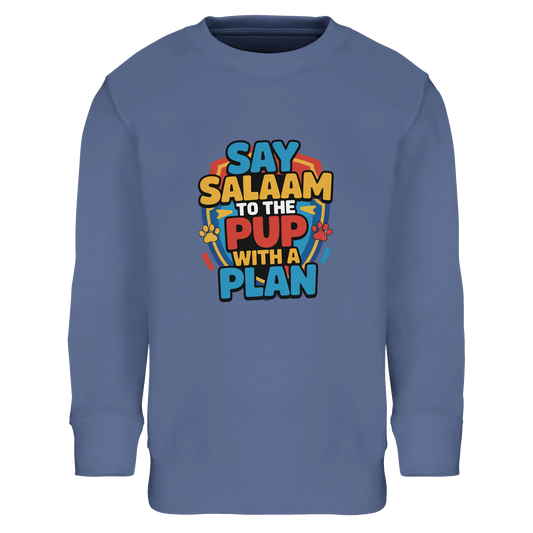 Say Salaam to the Pup with a Plan Part-Recycled Cotton-Poly Kids Sweatshirt (Blue / Marble Blue / Blue-Grey / Waikawa Grey). Kids jumper featuring a colourful square illustration panel and a slogan printed across the chest. The playful graphic blends bold cartoon lettering with a lively rescue-pup style illustration inspired by adventurous animated puppy teams loved by Paw Patrol fans. Soft cotton-poly fleece with recycled fibres provides warmth and durability for everyday clothing.