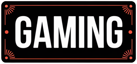 Say Salaam Clothing's Gaming sign with bold, uppercase 'GAMING' in a strong, modern font. The text is set on a black background with orange accents and decorative corner elements, creating a dynamic and energetic design.