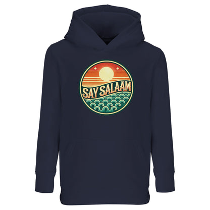 Say Salaam Sunset Glow Part-Recycled Cotton-Poly Kids Hoodie in French Navy, a deep navy shade close to ebony clay with rich midnight undertones. The warm sunset badge contrasts vividly against the dark base, combining retro surf-inspired styling with modest streetwear appeal. Crafted from a cotton and recycled polyester blend with brushed fleece lining for warmth. Relaxed fit ensures comfort for school, football and everyday Muslim youth fashion.
