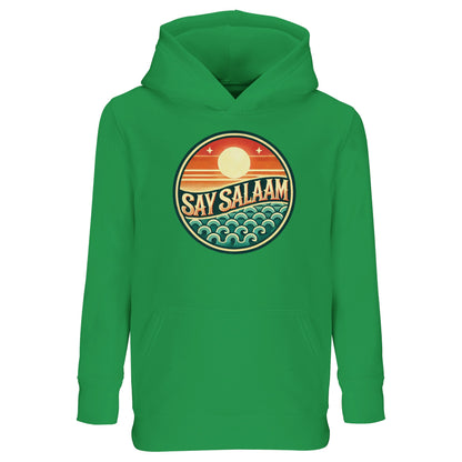 Say Salaam Sunset Glow Part-Recycled Cotton-Poly Kids Hoodie in Kelly Green, a vibrant fresh green shade comparable to spring green with subtle eucalyptus tones. The bold circular sunset emblem stands out clearly, featuring layered sun and ocean wave graphics in rich contrasting colours. Made from a cotton and recycled polyester blend with brushed fleece lining for warmth and durability. Relaxed fit hoodie ideal for active play, football culture and modest kids streetwear.