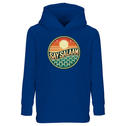 Say Salaam Sunset Glow Part-Recycled Cotton-Poly Kids Hoodie in Royal Blue, a vibrant cobalt blue tone with subtle dark midnight depth. The circular Sunset Glow design stands out with warm sunset oranges and cool teal wave elements. Constructed from a cotton and recycled polyester blend featuring brushed fleece for warmth and durability. A versatile relaxed-fit hoodie suited to school outfits, football supporters and modest everyday children’s streetwear.