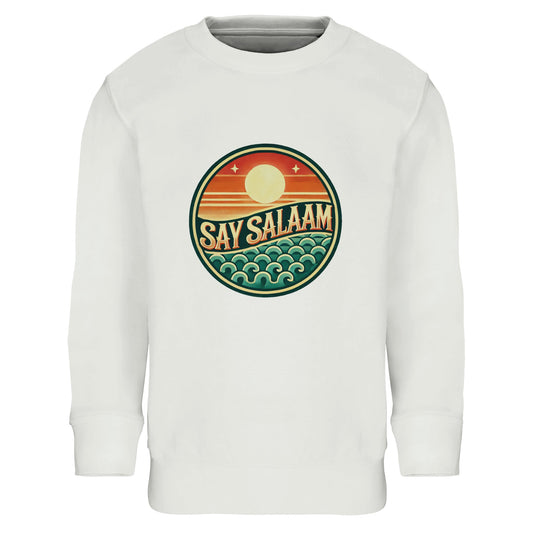 Say Salaam Sunset Glow Part-Recycled Cotton-Poly Kids Sweatshirt in White, a crisp white tone similar to platinum white with a clean bright finish. Circular Sunset Glow badge design across the chest, showing a rising sun over layered horizon lines and stylised ocean waves in warm sunset orange, deep red & teal green. Made from a cotton and recycled polyester blend with brushed fleece lining for warmth. Ribbed cuffs and hem provide durability for school, mosque visits and modest everyday streetwear.