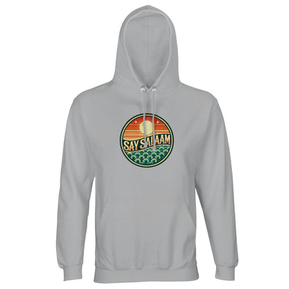 Say Salaam Sunset Glow Part-Recycled Unisex Cotton-Poly Hoodie in Ash, a soft light grey shade similar to silver chalice with subtle cool undertones. The vibrant sunset badge contrasts clearly against the pale neutral base, blending orange dusk gradients with teal wave detailing. Crafted from cotton and recycled polyester, GRS certified, featuring brushed fleece interior and 280gsm fabric weight for warmth. A versatile unisex hoodie suited for campus wear and modest contemporary fashion.