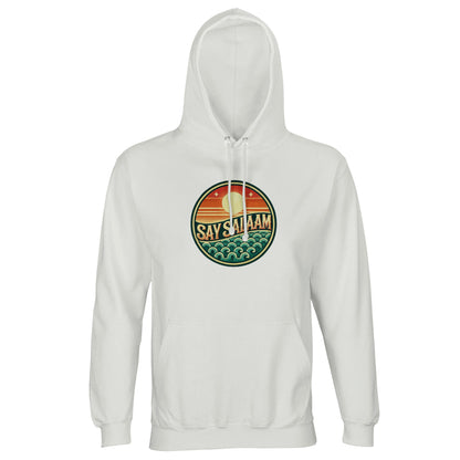 Say Salaam Sunset Glow Part-Recycled Unisex Cotton-Poly Hoodie in White, a crisp platinum white tone with a clean bright finish. Features the bold circular Sunset Glow badge centred on the chest, showcasing a rising sun over layered horizon stripes and stylised teal ocean waves in warm retro tones. Made from cotton and recycled polyester, GRS certified, with brushed fleece lining and a substantial 280gsm weight. A relaxed unisex hoodie ideal for modest Muslim streetwear and everyday winter layering.