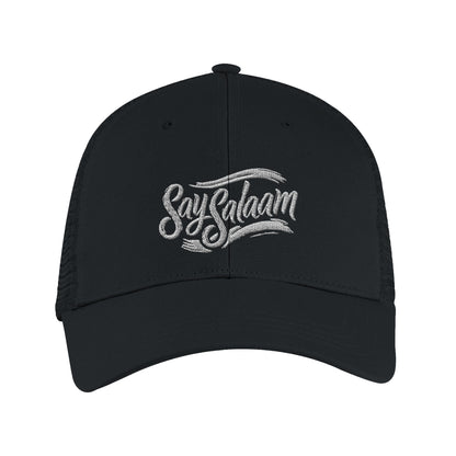 Say Salaam Classic Recycled Cap in Black featuring tonal embroidered Say Salaam script on a classic six-panel silhouette with curved peak. Produced using 100% GRS certified recycled polyester with breathable recycled mesh rear panels for all-day wear. Snapback size adjuster allows a comfortable, adaptable fit. A sustainable, minimalist cap designed for modest fashion, casual clothing, travel days, gifting, and everyday wear, streetwear look, neutral outfits, and essential wardrobe pieces with a clean finish