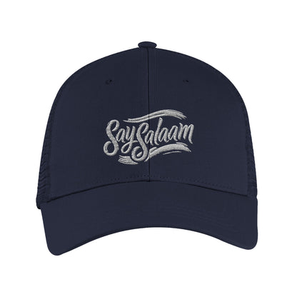 Say Salaam Classic Recycled Cap in French Navy with clean embroidered Say Salaam lettering on a structured s6-panel design and pre-curved peak. Crafted from 100% GRS certified recycled polyester and finished with breathable recycled mesh back panels for lightweight comfort. Adjustable snapback fastening delivers a secure, versatile fit for most head sizes. Sustainable everyday cap suited to modest streetwear, casual outfits, travel, gifting, & easy layering with minimalist clothing, neutral, relaxed colours