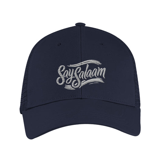 Say Salaam Classic Recycled Cap in French Navy with clean embroidered Say Salaam lettering on a structured s6-panel design and pre-curved peak. Crafted from 100% GRS certified recycled polyester and finished with breathable recycled mesh back panels for lightweight comfort. Adjustable snapback fastening delivers a secure, versatile fit for most head sizes. Sustainable everyday cap suited to modest streetwear, casual outfits, travel, gifting, & easy layering with minimalist clothing, neutral, relaxed colours