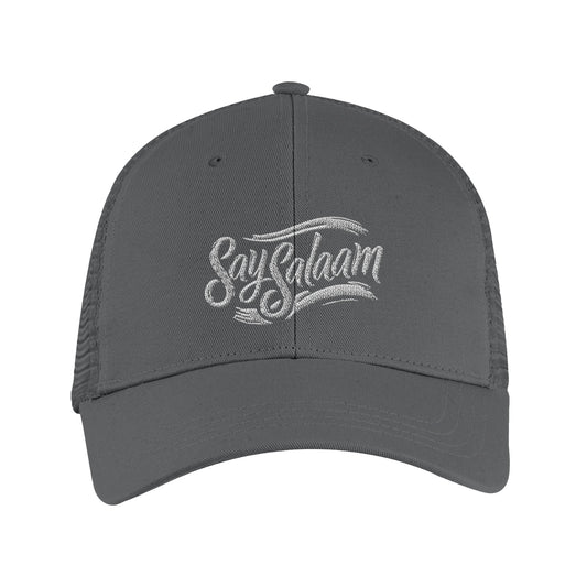 Say Salaam Classic Recycled Cap in Graphite Grey featuring minimalist embroidered Say Salaam script on a structured six-panel crown with curved peak. Made from 100% GRS certified recycled polyester with breathable recycled mesh rear panels for everyday comfort. Adjustable snapback closure, easy, flexible fit, casual wear, streetwear, travel & outdoors. A sustainable, understated hat designed for modest fashion, gifting, and daily clothing rotation, pairing easily with hoodies, t-shirts, jackets & essentials
