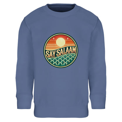 Say Salaam Sunset Glow Part-Recycled Cotton-Poly Kids Sweatshirt – 10Y. A 10Y sweatshirt with a Say Salaam graphic for Say Salaam fans. A casual clothing option for everyday outfits, fan-themed gifts and relaxed occasions.