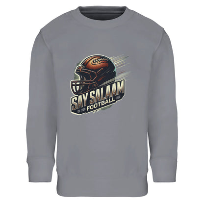 Say Salaam to the American Football Fan Design #1 Part-Recycled Cotton-Poly Kids Sweatshirt – Grey Melange / Heather Grey. A timeless neutral sweatshirt featuring bold helmet and ball graphic. Ethically produced with recycled cotton-poly, it’s modest, durable and breathable. Ideal for school, prayer time, casual wear or gameday excitement. A faith-friendly, sustainable wardrobe staple for young American football supporters.