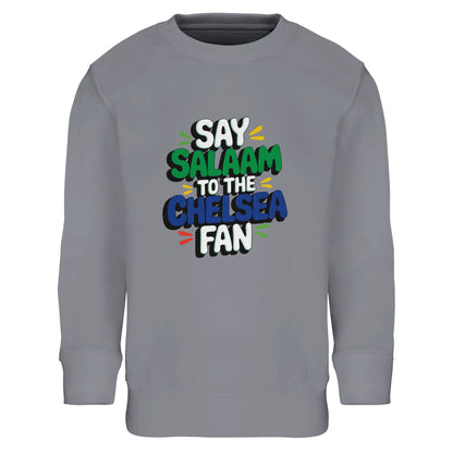 Say Salaam to the Chelsea Fan Design #2 kids sweatshirt featuring bold stacked lettering that stands out cleanly against a soft grey melange base. This cotton-poly jumper is ideal for young Chelsea supporters who enjoy football culture, Muslim wear, and versatile everyday clothing. Suitable for ages four to fourteen, it’s easy to wear to school, match days, relaxed weekends, or watching games at home. A cosy, modest football sweatshirt that balances comfort, neutrality, and club pride while saying Salaam.