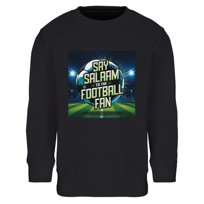 Black / Deep Black / Zeus Say Salaam to the Football Fan Design #2 kids sweatshirt featuring a bold football graphic set inside a floodlit stadium scene, with central Salaam lettering layered over a glowing pitch. Designed for young Muslim football supporters, this modest sweatshirt blends Islamic clothing values with everyday sportswear, ideal for school, weekends, mosque outings, matchdays, family viewing nights, and football conversations rooted in faith, identity, and community pride.