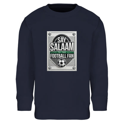 French Navy / Ebony Clay Say Salaam to the Football Fan Design #3 kids sweatshirt set on a deep navy base that enhances the contrast of the football poster graphic and Islamic Salaam message. The design references classic football aesthetics with a structured layout and central emblem. Made from a cotton and recycled polyester blend with a cosy fleece interior, this cheap children’s sweatshirt offers strong value and durability for Muslim families seeking modest apparel rooted in football identity.
