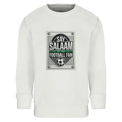 White / Platinum Say Salaam to the Football Fan Design #3 kids sweatshirt presenting a clean, high-contrast base that allows the football badge-style print and Salaam text to remain sharp and readable. The centred graphic draws from vintage football poster layouts with a balanced, symmetry. Crafted from cotton and recycled polyester with a soft brushed fleece interior, this affordable sweatshirt suits Muslim families looking for modest apparel that blends football culture with Islamic expression & comfort.
