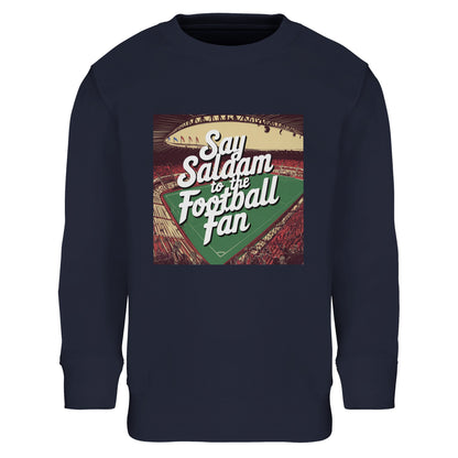 French Navy / Midnight Say Salaam to the Football Fan Design #4 kids sweatshirt pairing a deep navy shade with a classic printed football graphic on the front panel. The darker tone of the cheap sweater gives the piece a timeless, understated look while allowing the lettering and artwork to remain crisp and readable. Crafted with brushed fleece and durable cotton-poly construction, it works well for everyday wear, cooler weather, and football-led style influenced by Islamic culture.