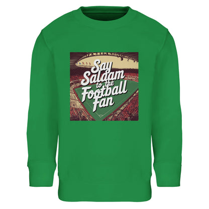 Kelly Green / Pitch Green Say Salaam to the Football Fan Design #4 kids sweatshirt using a vibrant grass-green tone that echoes classic football pitches and terraces. The central printed artwork stands out clearly against the bright base, combining heritage football visuals with friendly, welcoming lettering. Made from a brushed-fleece cotton-poly blend, it suits active days, casual outings, and football-inspired clothing shaped by Islamic and Muslim cultural expression.