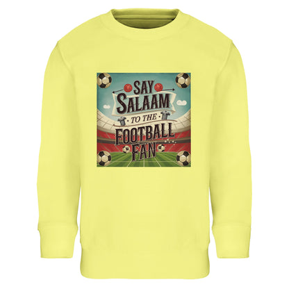 Say Salaam to the Football Fan Design #5 kids sweatshirt in Light Yellow / Lemon Chiffon, offering a bright, cheerful take on football-inspired streetwear. The brushed fleece lining adds warmth while remaining lightweight and comfortable for all-day wear. An affordable Muslim kids football sweatshirt that stands out without sacrificing Islamic practicality, perfect for young fans who enjoy bold colour, soft fabric, easy-care clothing, and standout pieces within casual everyday outfits.