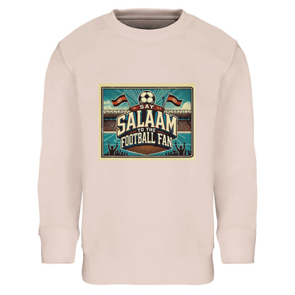 Say Salaam to the Football Fan Design #7 kids sweatshirt in Creamy Pink / Oyster Pink, pairing soft colour with a vintage football stadium illustration and bold fan lettering. Crafted from a cotton and recycled polyester blend, this sweatshirt offers warmth and everyday comfort for streaming all the EPL games. A modest, well-priced kids football sweatshirt for ages 4–14, delivering durable fabric, easy care and affordable football-inspired wear.