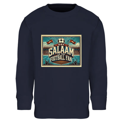 Say Salaam to the Football Fan Design #7 kids sweatshirt in French Navy / Ebony Clay, designed with a classic stadium illustration celebrating football culture and terrace tradition. Made from a soft cotton and recycled polyester blend, this sweatshirt keeps kids comfortable during school, weekends and football evenings. A modest, affordable football sweatshirt for boys and girls aged 4–14, combining durable fabric, easy care and well-priced everyday fanwear.