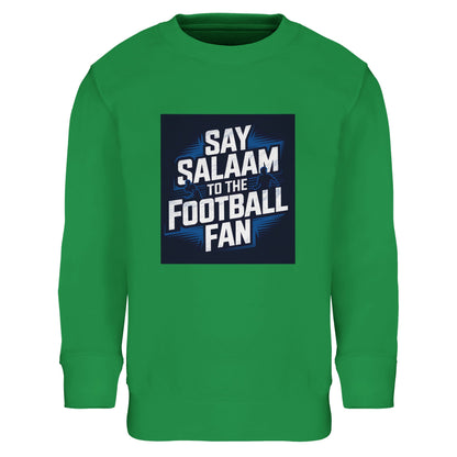 Kelly Green Say Salaam to the Football Fan kids sweatshirt in a pitch-ready green tone, finished with a bold football graphic inspired by stadium nights and big goals. Soft cotton and recycled polyester blend for warmth and comfort across ages. Perfect for young football fans supporting a team, club or FC, wearing club colours on match day, watching fixtures at home, or travelling to games. Modest Muslim kids wear with streetwear attitude, ideal for gifting, and good-price football clothing.