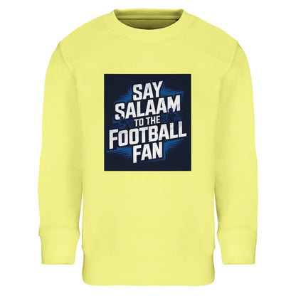 Light Yellow / Lemon Chiffon Say Salaam to the Football Fan kids sweatshirt with a bright football graphic that pops under stadium-style lighting. Cotton and recycled polyester blend keeps it cosy and durable for kids and teens. Great for young football fans supporting a team, club or FC, wearing club colours at school, match day, or at home watching games. Modest Muslim kids wear that suits street style and gifting, with good-value fanwear for football weekends, tournaments, and fresh footie clothing.