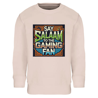 Creamy Pink / Oyster Pink children’s sweatshirt with the Say Salaam to the Gaming Fan artwork framed in a retro console design and vintage arcade lettering. A warm cotton and recycled polyester blend long-sleeve top for young gamers who split time between homework and headset chat. A modest, comfortable sweatshirt for boys and girls who greet friends with peace before logging into PlayStation, Xbox and online multiplayer platforms.
