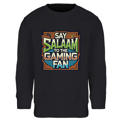 Deep Black / Zeus youngsters’ sweatshirt showcasing the Say Salaam to the Gaming Fan artwork in a bold retro console block with vintage gaming lettering. A durable cotton and recycled polyester blend long-sleeve top for children immersed in competitive multiplayer, headset teamwork and console tournaments. A modest staple sweatshirt for boys and girls who represent gaming culture while greeting teammates with peace.