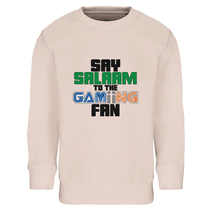 Say Salaam to the Gaming Fan Original Part-Recycled Cotton-Poly Kids Sweatshirt – Creamy Pink / Oyster Pink with multicolour retro-style text and pixel-styled ‘GAMING’ below a green ‘Salaam’. A stylish, soft, basic streetwear jumper for Muslim children into Roblox, Minecraft, EAFC, Pokémon or FNAF. Made for girl and boy fans who love pressing start on fun that’s halal, kind and creative. Cosy and sustainable, great to wear at pre-suhoor sessions, Discord calls and gifting gamers something truly original.