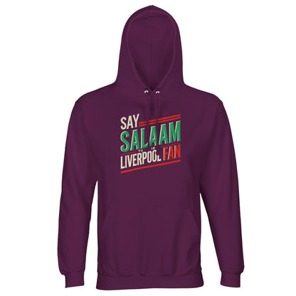 Say Salaam to the Liverpool Fan Design #1 Part-Recycled Unisex Cotton-Poly Hoodie – Astral Purple / Wine Berry featuring a rich purple backdrop for cream, green, and red text inspired by Liverpool passion and peaceful intent. The brushed fleece hoodie offers softness, durability, and modest warmth, crafted from an 80/20 cotton-poly blend. A perfect blend of faith, fandom, and flair — bold enough for Anfield, humble enough for everyday wear.