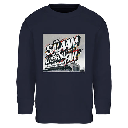 Say Salaam to the Liverpool Fan Design #2 Part-Recycled Cotton-Poly Kids Sweatshirt – French Navy / Deep Marine with graffiti lettering streaked in white and crimson over Anfield’s illustrated roof. The sleek, urban colour contrasts the electric typography. Crafted from sustainable brushed fleece for warmth and ease of wear, it’s ideal for young Liverpool fans expressing peace, passion, and purpose – whether at the stadium, school, or Friday practice.