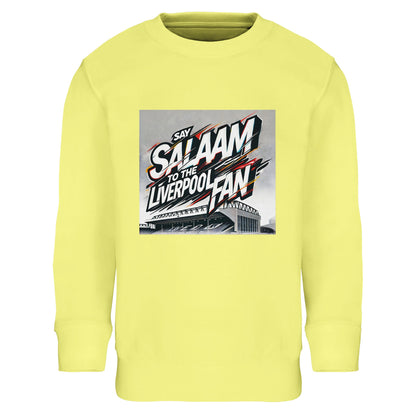 Say Salaam to the Liverpool Fan Design #2 Part-Recycled Cotton-Poly Kids Sweatshirt – Light Yellow / Matchday Glow with vibrant graffiti-style lettering over a hand-drawn Anfield Stadium. White, red, and black accents burst with Mohamed Salah optimism. The sustainable brushed cotton-poly fleece offers cosy warmth and lasting softness. Ideal for young Liverpool fans radiating positivity, faith, and energy — uniting the game’s thrill with the peaceful message behind every Salaam.