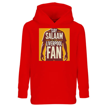 Say Salaam to the Liverpool Fan Design #3 Part-Recycled Cotton-Poly Kids Hoodie – Bright Red / Matchday Scarlet with the words ‘Say Salaam to the Liverpool Fan’ in striking yellow and cream block lettering framed by the silhouette of a standing player. The artwork evokes vintage poster energy and Anfield loyalty. This brushed fleece hoodie, made from 80% cotton and 20% recycled polyester, wraps kids in warmth and team spirit — perfect for matchdays, mosque days, or everyday adventures.