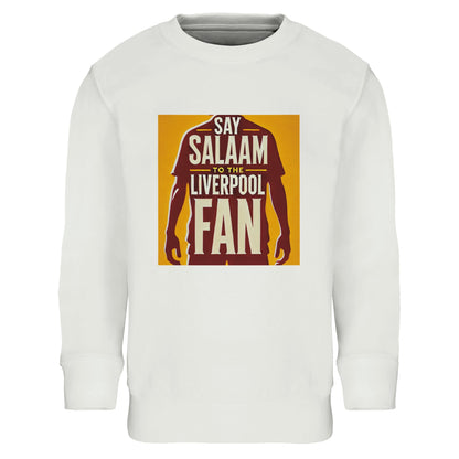 Say Salaam to the Liverpool Fan Design #3 Kids Sweatshirt – White / Platinum featuring a stylised red silhouette inspired by Mo Salah standing tall in front of bold text and a gold backdrop. Made from an 80% cotton and 20% recycled polyester blend, this soft brushed-fleece sweatshirt celebrates faith, humility, and football pride. A modest, durable choice for young Muslim fans who wear their support for Salah and the Reds like a badge of identity and devotion — proud and true.