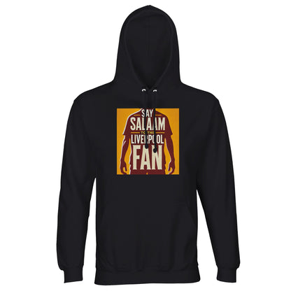 Say Salaam to the Liverpool Fan Design #3 Part-Recycled Unisex Cotton-Poly Hoodie – Black / Onyx with a striking golden print of a Liverpool player silhouette emerging from deep red tones. Made from sustainably sourced cotton and recycled polyester, it offers durability, warmth, and conscience-driven comfort. Designed for Muslim and global football fans alike, this hoodie captures the unity of the terraces and the everyday reminder that Salaam belongs wherever the game is played.