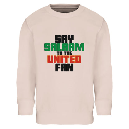 Say Salaam to the Manchester United Fan Original Part-Recycled Cotton-Poly Kids Sweatshirt – Creamy Pink / Oyster Pink featuring bold, text-based design in Black, La Salle Green and Thunderbird Red. A minimalist, matchday-ready jumper made for young Red Devils – from Cantona collars to Class of ’92 nostalgia. For kids who love Champions League nights, ask about Rashford, and scroll transfer news between prayers. A fusion of fandom, faith, and football history.