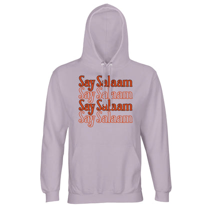 Lilak / Lilac / Wisteria Purple unisex hoodie showcasing the Say Salaam 4-Line stacked chest print in warm retro orange script. The soft purple base enriches the contrast, allowing the four-line typographic block to feel expressive yet balanced. Clean alignment and layered repetition create visual depth with vintage character. Brushed fleece interior and lined hood complete a hoodie rooted in modest comfort and peaceful greeting culture.