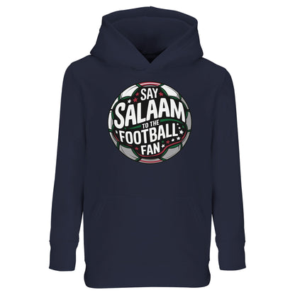 French Navy / Ebony Clay kids Islamic hoodie showcasing the Say Salaam to the Football Fan Design #1 circular football crest print. Dark terrace-ready colour reflecting evening fixtures and cup nights. Muslim youth football streetwear blending stadium badge aesthetics, bold lettering and central ball graphic, perfect for academy squads, match-day travel and little fans who celebrate goals with Islamic pride.