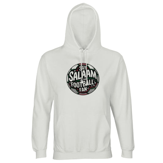 White / Platinum unisex hoodie featuring the Say Salaam to the Football Fan Design #1 circular badge graphic. The design has a bold round football crest shape with a dark charcoal and black base, stadium floodlight glow & layered typography wrapping the sphere. Crisp white and soft green accents create contrast on the clean light background, giving it a modern sporty tone. Muslim football streetwear blending Islamic identity with matchday culture, ideal for stadium visits, 5-a-side games & community events.