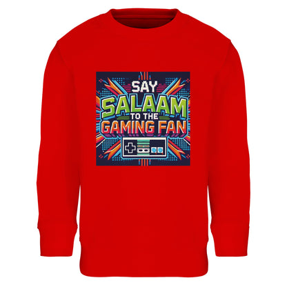 Bright Red / Rosso Corsa Islamic kids sweatshirt featuring Say Salaam to the Gaming Fan Design #2 graphic. Muslim gaming streetwear crafted from soft 80% cotton and 20% recycled polyester with brushed fleece lining for warmth during tournaments and casual play. Eco-friendly modest sweatshirt for console gaming, PC streaming, esports training and Islamic youth events. Ribbed cuffs and hem provide a snug fit while expressing Muslim pride in competitive gaming spaces.