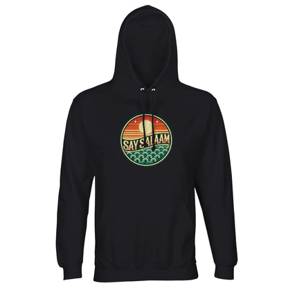 Black / Deep Black unisex hoodie featuring the Say Salaam Sunset Glow circular skyline print in vivid sunset colours. The dark base maximises contrast, allowing the round chest badge to glow with layered orange, red and teal tones. Balanced symmetry and bold typography create strong focal presence. Designed for modest Islamic fashion, this brushed fleece hooded pullover combines faith-based apparel with everyday streetwear durability, well priced.